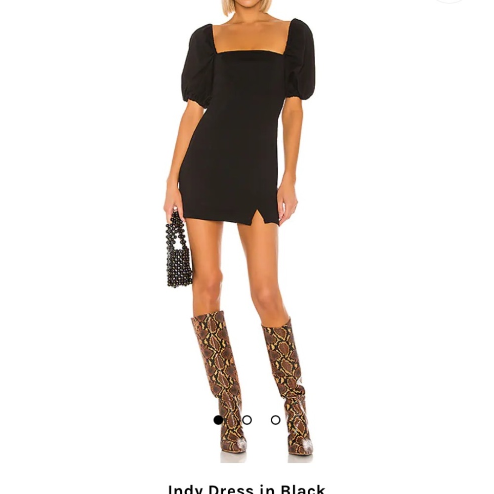 Little black dress with puff sleeves